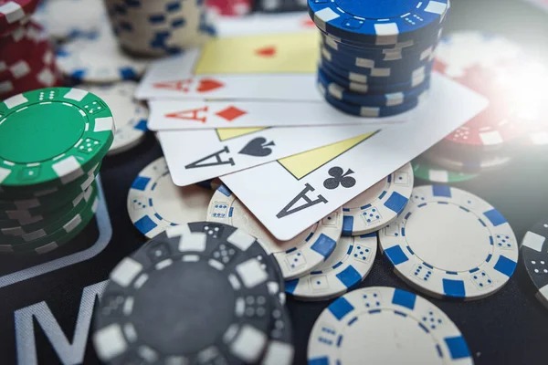 Live Sic Bo dealer shaking the cage with three dice inside